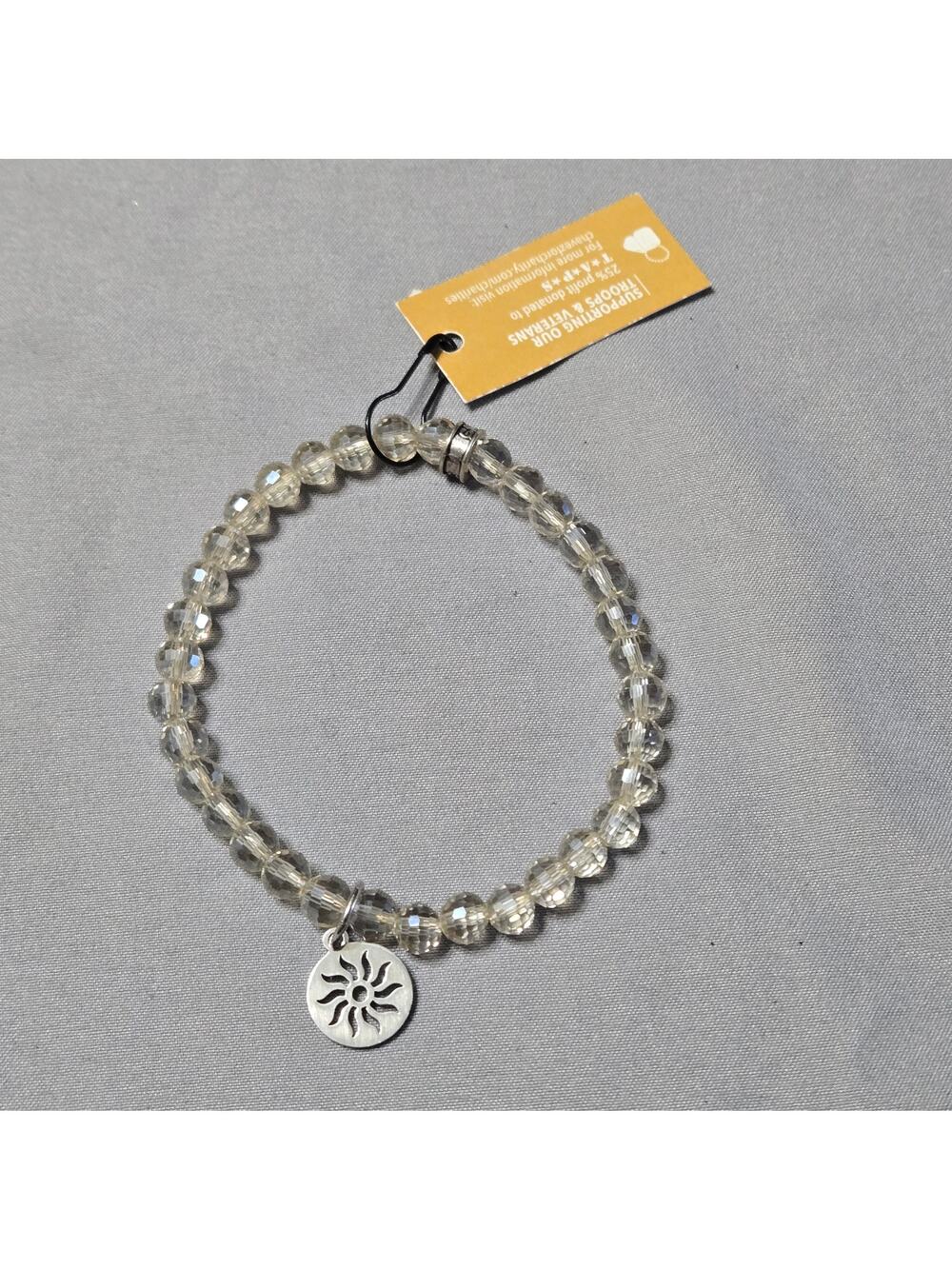 Clear Quartz Faceted Beaded Stretch Bracelet with Sunburst Charm